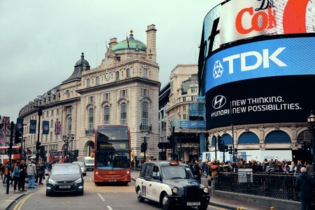 LONDON, UK - SEP 27: Piccadilly Circus street view on September 27, 2013 in London, UK. Built in 1819, it is the major shopping, entertainment areas and key tourist attractions in London.のeditorial素材