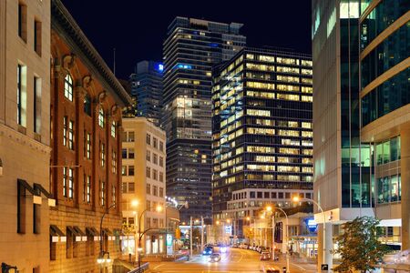 VANCOUVER, BC - AUG 17: Downtown street view at night on August 17, 2015 in Vancouver, Canada. With 603k population, it is one of the most ethnically diverse cities in Canada.のeditorial素材