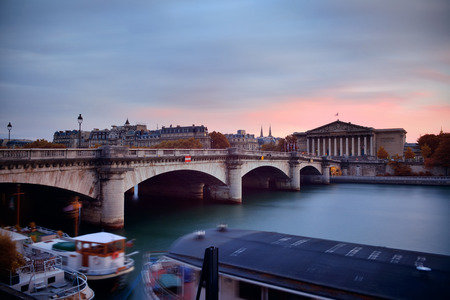Paris River Seine with Pont de la Concorde and Assemblee Nationale at sunsetの写真素材