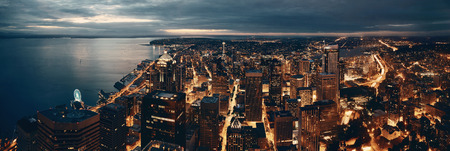 Seattle rooftop panorama view with urban architecture at night.の写真素材