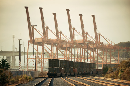 SEATTLE, WA - AUG 14: Crane Tower and cargo train at sea port on August 14, 2015 in Seattle. Seattle...