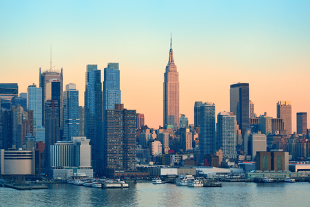 New York City midtown Manhattan sunset skyline panorama view over Hudson Riverの写真素材