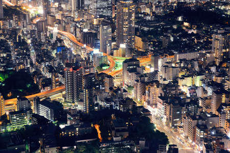 Tokyo urban skyscraper skyline rooftop view at night, Japan.の写真素材