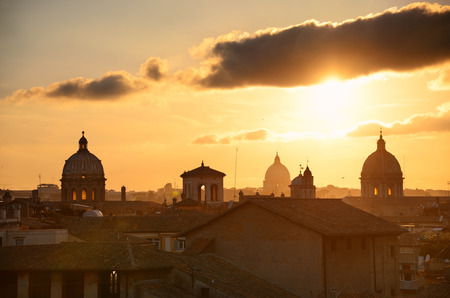 Rome rooftop view at sunset with ancient architecture in Italy.の写真素材
