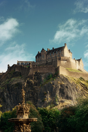 Edinburgh castle with fountain as the famous city landmark. United Kingdom.のeditorial素材