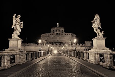 Castle Sant Angelo in Italy Rome at night and angel statue on bridgeのeditorial素材