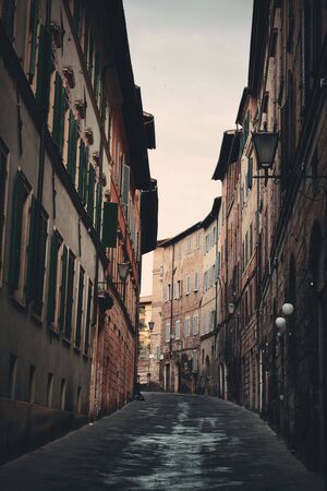 Street view with old buildings in Siena, Italy.の写真素材