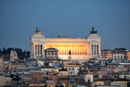 Monumento Nazionale a Vittorio Emanuele II as the famouse landmark historic architecture in Rome Italy at duskのeditorial素材