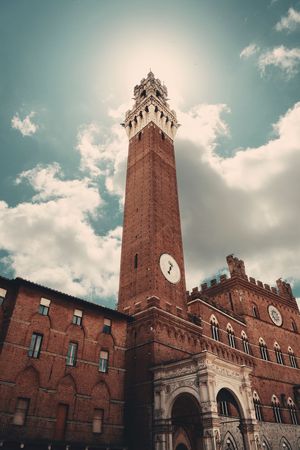City Hall Bell Tower closeup in Siena Italy.の写真素材