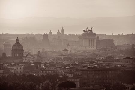 Rome rooftop view at sunrise silhouette black and white with ancient architecture in Italy.の写真素材
