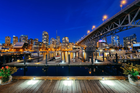 Vancouver False Creek at night with bridge and boat.の写真素材