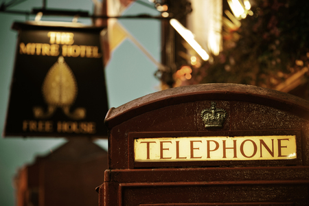 LONDON, UK - SEP 27: London Street view with telephone box on September 27, 2013 in London, UK....