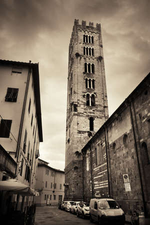 Lucca street view with bell tower in Italyの写真素材
