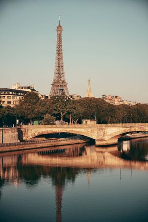 Eiffel Tower and bridge over River Seine.の写真素材