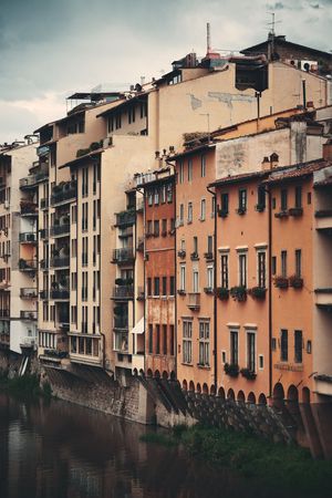 Italian style old buildings along Arno River in Florence, Italy.の写真素材