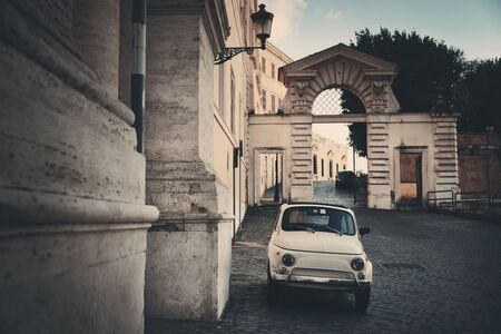 Street view with vintage car in Rome, Italy.のeditorial素材
