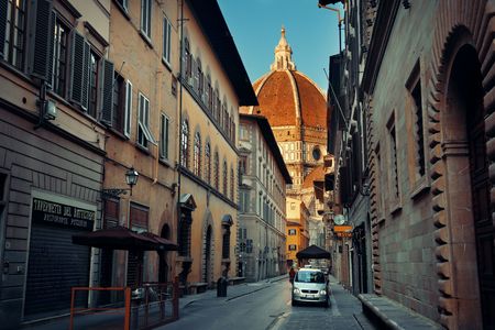 FLORENCE - MAY 20: Street view with Cathedral on May 20, 2016 in Florence, Italy. Florence was a center of medieval European trade and finance and is the birthplace of the Renaissanceのeditorial素材