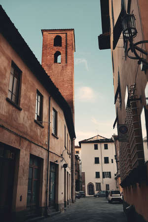 Lucca street view with bell tower in Italyの写真素材
