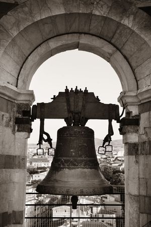 Bell on top of Pisa Leaning Tower in Italyの写真素材