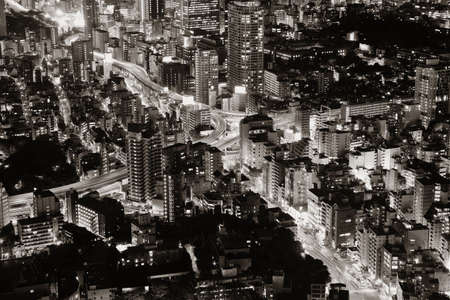 Tokyo urban skyscraper skyline rooftop view at night, Japan.の写真素材