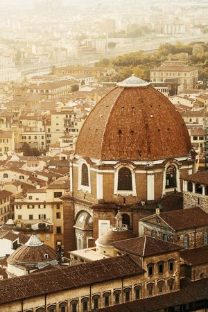 Florence rooftop view with Medici Chapels dome in Italy at sunriseの写真素材