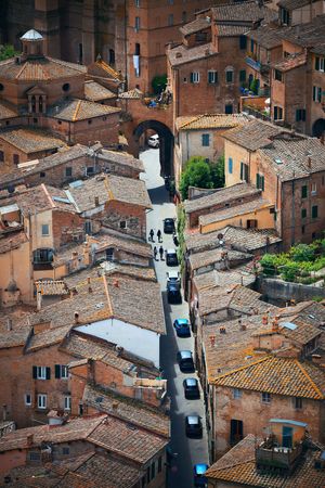 Medieval town Siena rooftop view with historic buildings in Italy