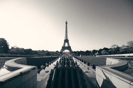 Eiffel Tower with fountain pipe as the famous city landmark in Parisの写真素材