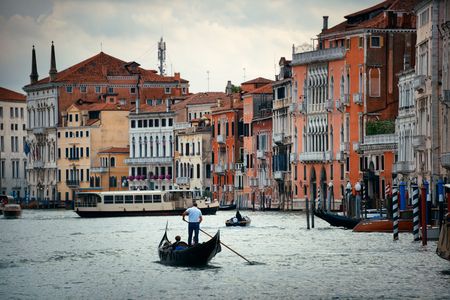 Gondola in canal in Venice, Italy.の写真素材