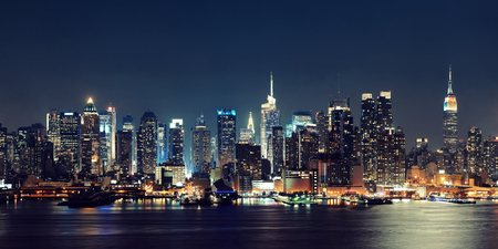 Midtown Manhattan skyline at dusk panorama over Hudson Riverの写真素材