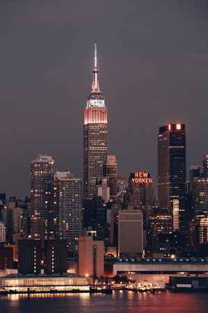 NEW YORK CITY - JUL 4: Empire State Building with skyscrapers on July 4, 2015 in Manhattan, New York City. With population of 8.4M, it is the most populous city in the United States.のeditorial素材