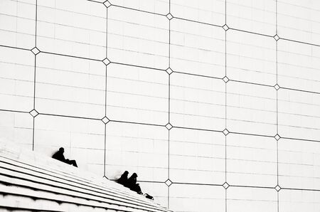 PARIS, FRANCE - MAY 13: Resting tourists in la Defense business district on May 13, 2015 in Paris. With the population of 2M, Paris is the capital and most-populous city of France.のeditorial素材