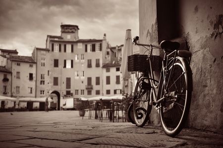Piazza dell Anfiteatro in Lucca Italy with bikeの写真素材