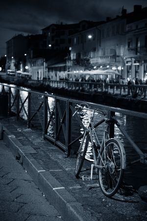 A bike park at waterfront of Naviglio Grande canal in Milan, Italy.の写真素材