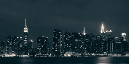 Midtown Manhattan skyline at dusk panorama over East Riverの写真素材