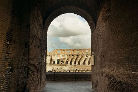 Archway in Colosseum, the world known landmark and the symbol of Rome, Italy.の写真素材