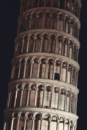 Leaning tower closeup view at night in Pisa, Italy as the worldwide known landmark.の写真素材