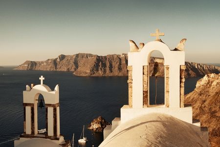 Santorini skyline with buildings and bell tower in Greece.の写真素材