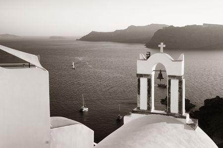 Santorini island with traditional architecture and bell tower in Greece.の写真素材