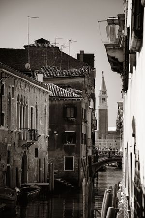 Bell tower among historical buildings in Venice. Italy.の写真素材