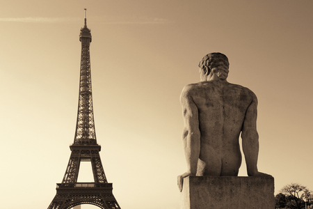 Eiffel Tower with statue as the famous city landmark in Parisのeditorial素材