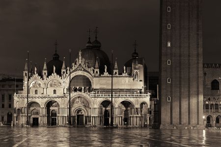 Bell tower and church of St Mark at night at Piazza San Marco in Venice, Italy.の写真素材