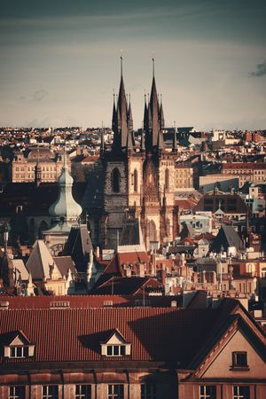 Church of Our Lady before TÃ½n and Prague skyline rooftop view in in Czech Republicの写真素材