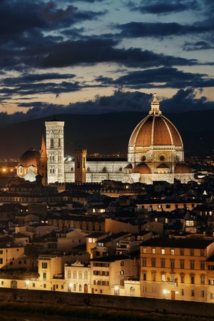 Florence Cathedral with city skyline viewed from Piazzale Michelangelo at nightの写真素材