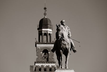 Giuseppe Garibaldi Monument and the bell tower of Sforza Castle in Milan, Italy.のeditorial素材