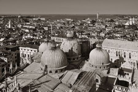 Venice skyline viewed from above at clock tower in St Markâs square. Italy.の写真素材