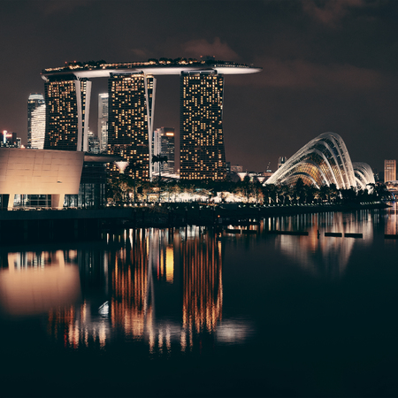 Singapore skyline at night with urban buildings