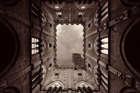 City Hall Bell Tower viewed from patio in Siena Italy.のeditorial素材