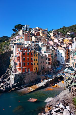 Riomaggiore waterfront view with buildings in Cinque Terre, Italy.の写真素材