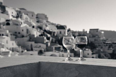 Wine on rooftop in Santorini, Greece.の写真素材