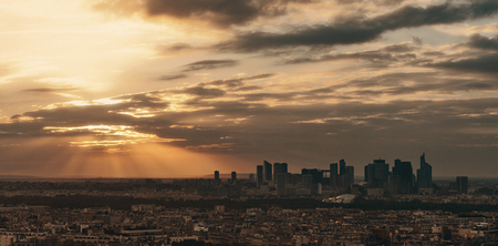 Paris city skyline rooftop view with la Defense at sunset, France.の写真素材